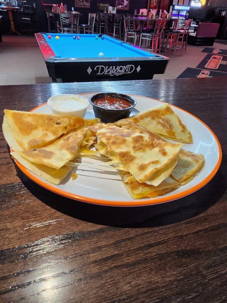 Grilled cheese quesadilla with dipping sauces, perfect bar snack at Jimmy’s Pro Billiards game room